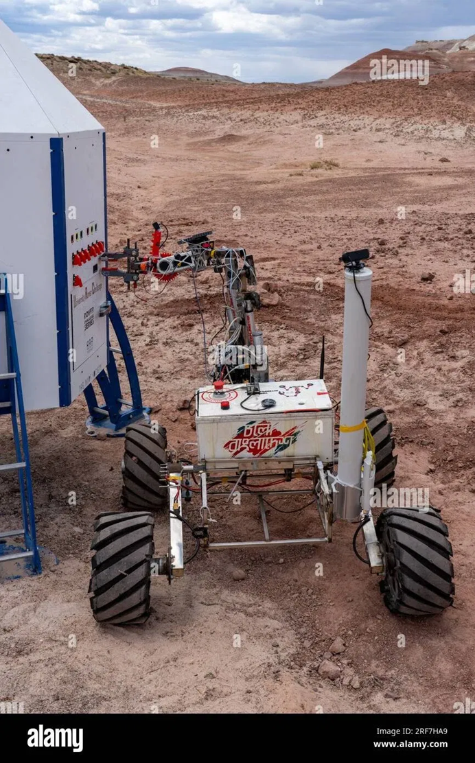 Six degree-of-freedom robotic arm being bench-tested against a brick wall